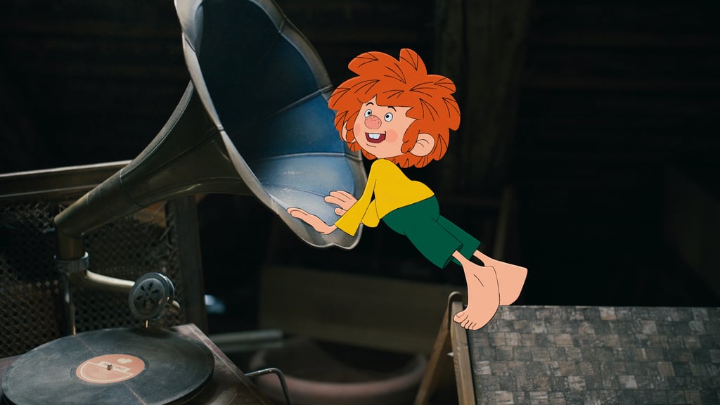 Cartoon character with orange hair clinging to a curved metal playground slide in a dark setting.