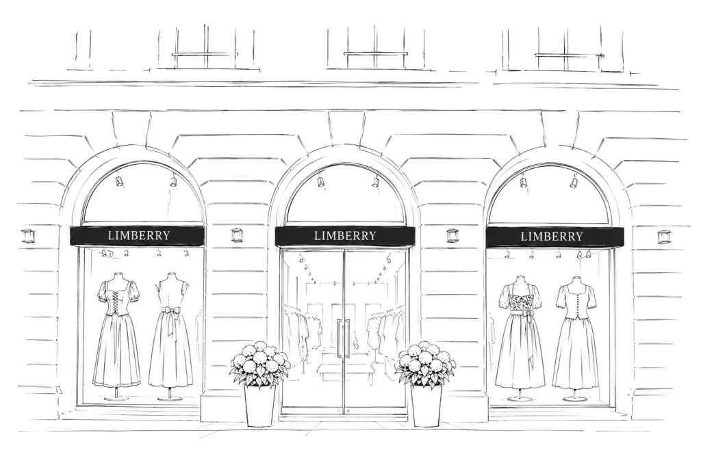 Limberry fashion boutique storefront with three arched windows displaying dresses and potted flowers outside.