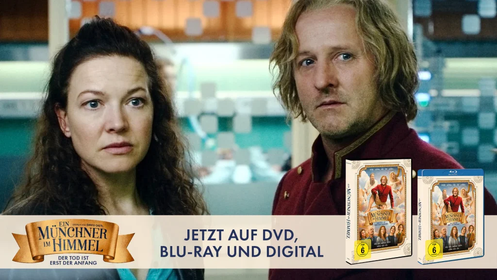 Two surprised-looking characters in a film promo banner, with the film's DVD and Blu-ray boxes on the right side.